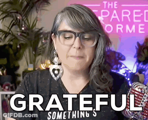 A Woman Wearing Glasses And Earrings Says Grateful Something GIF
