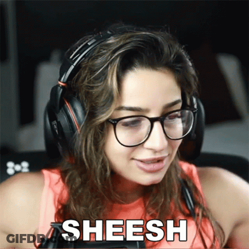 A Woman Wearing Glasses And Headphones Has The Word Sheesh Above Her Head GIF