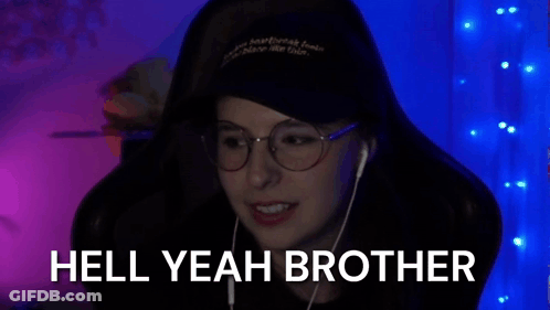 A Woman Wearing Glasses And Headphones Is Smiling In Front Of A Blue Background And The Words `` Hell Yeah Brother '' . GIF
