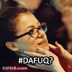 A Woman Wearing Glasses Holds Her Hand To Her Chin And Says #Dafuoq ? GIF
