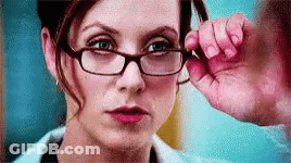 Woman Adjusting Glasses GIF