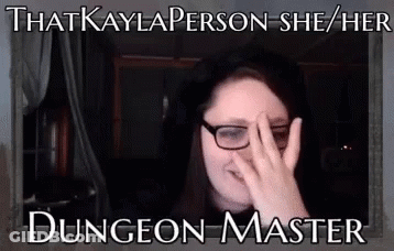 A Woman Wearing Glasses Is Covering Her Face With Her Hand And The Caption That Kayla Person She Her Dungeon Master GIF