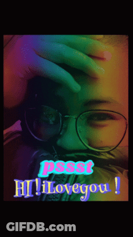 A Woman Wearing Glasses Is Covering Her Face With Her Hand And The Words Pssst Hi Love You GIF