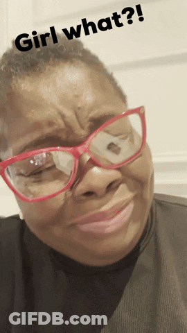 A Woman Wearing Glasses Is Making A Face With The Words Girl What Written Above Her GIF