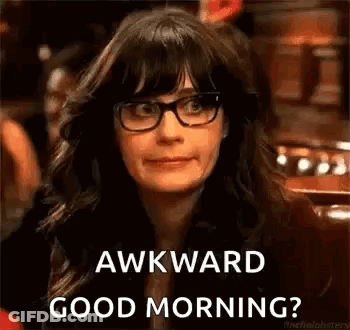A Woman Wearing Glasses Is Making A Funny Face And Saying `` Awkward Good Morning ? '' GIF