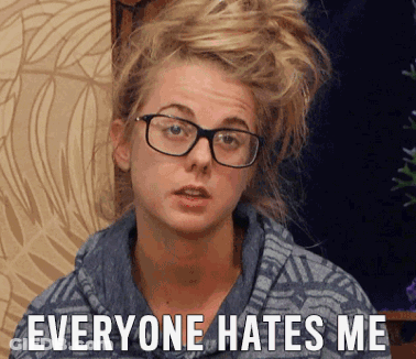 A Woman Wearing Glasses Is Making A Funny Face And Says Everyone Hates Me GIF