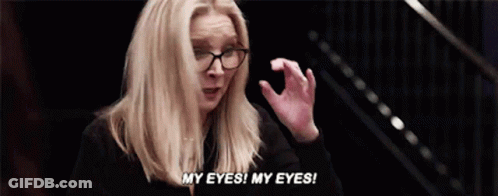 A Woman Wearing Glasses Is Screaming And Saying " My Eyes My Eyes " GIF