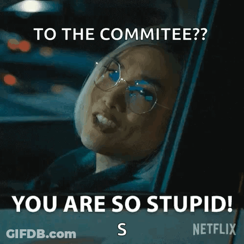A Woman Wearing Glasses Is Sitting In A Car And Says `` To The Committee ? You Are So Stupid ! S '' GIF