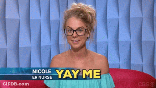 A Woman Wearing Glasses Is Sitting In Front Of A Sign That Says " Nicole Er Nurse Yay Me " GIF