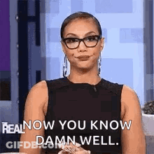 A Woman Wearing Glasses Is Smiling And Saying `` Real Now You Know Damn Well '' . GIF