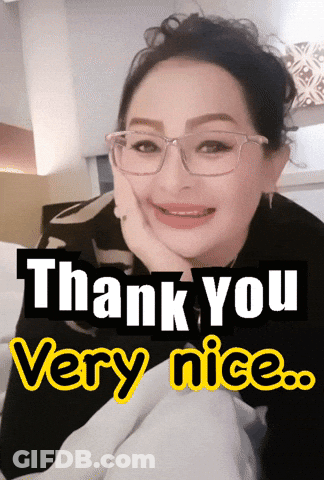 A Woman Wearing Glasses Is Smiling With The Words Thank You Very Nice Below Her GIF