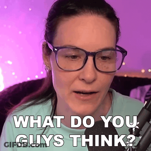 A Woman Wearing Glasses Is Talking Into A Microphone And Says " What Do You Guys Think " GIF
