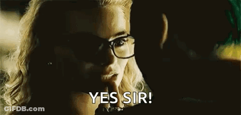 Woman In Glasses Talking To Man In Movie GIF