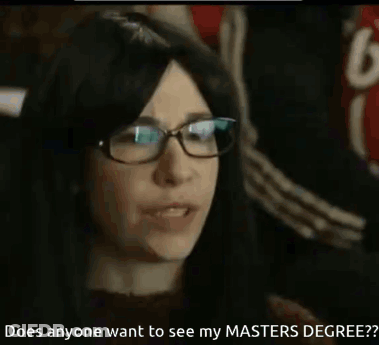 A Woman Wearing Glasses Says Does Anyone Want To See My Masters Degree GIF