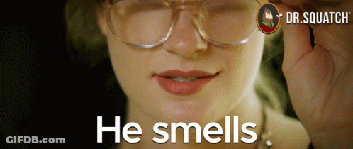 A Woman Wearing Glasses Says He Smells GIF