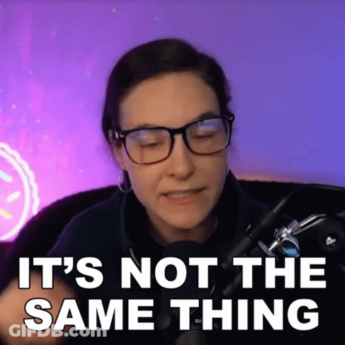 A Woman Wearing Glasses Says It 'S Not The Same Thing In Front Of A Microphone GIF