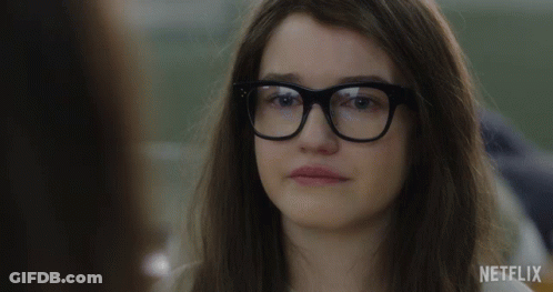 A Woman Wearing Glasses Says " This Is Really Happening " In A Netflix Ad GIF