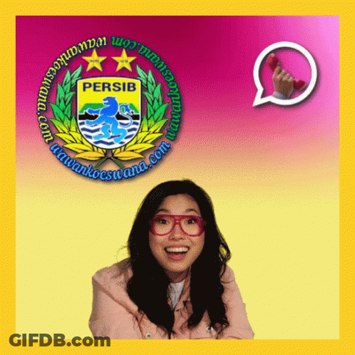 A Woman Wearing Glasses Stands In Front Of A Logo For Persib GIF