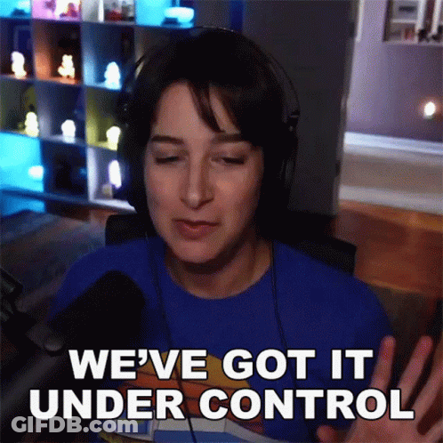 A Woman Wearing Headphones And A Blue Shirt Says " We 'Ve Got It Under Control " GIF