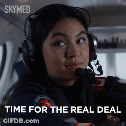 A Woman Wearing Headphones And A Headset Says Time For The Real Deal GIF