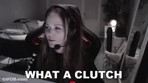 A Woman Wearing Headphones And A Microphone Is Sitting In A Chair In Front Of A Computer . GIF