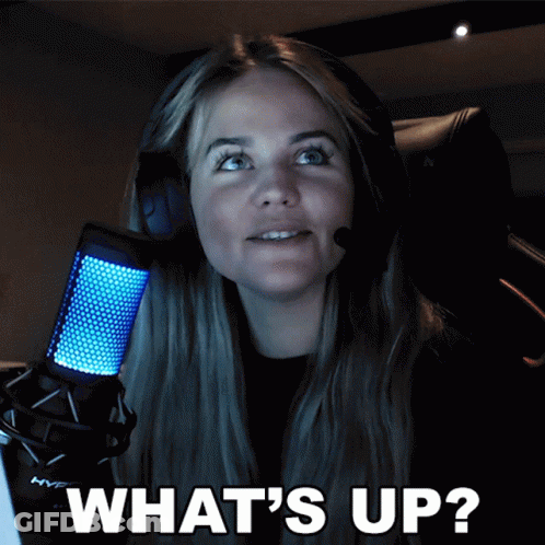 A Woman Wearing Headphones And A Microphone With The Words What 'S Up On The Bottom GIF