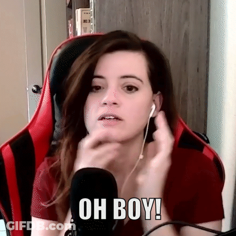 A Woman Wearing Headphones And A Red Shirt Is Sitting In Front Of A Microphone . GIF