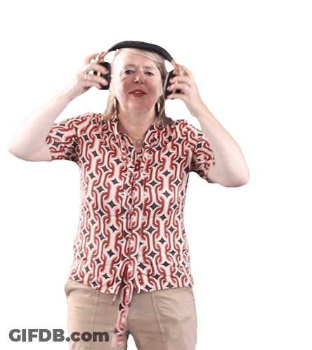 A Woman Wearing Headphones And A Shirt With A Pattern That Says S On It GIF