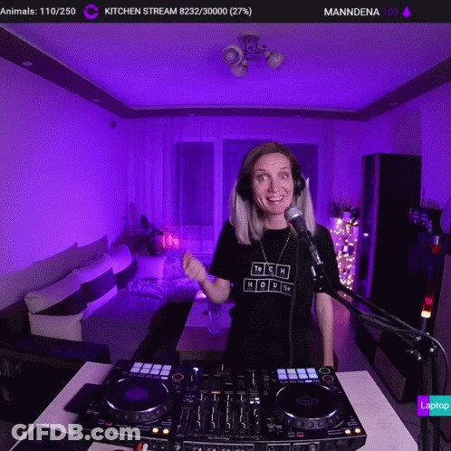 A Woman Wearing Headphones And A Tshirt That Says Tech House GIF