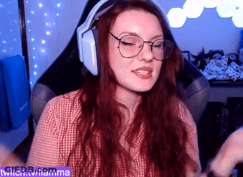A Woman Wearing Headphones And Glasses Is On Twitch.tv/fiamma GIF
