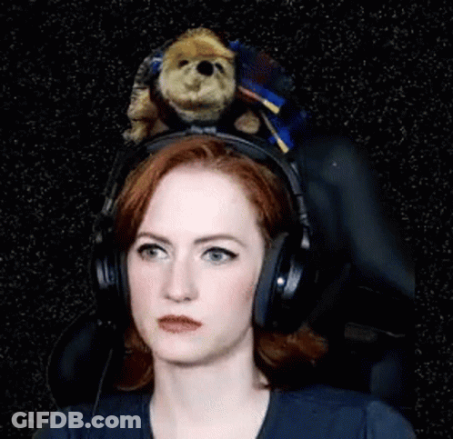 A Woman Wearing Headphones Has A Teddy Bear On Her Head And The Caption Says The Audacity GIF
