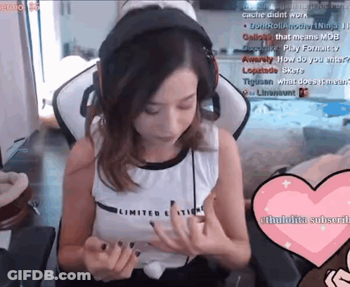 A Woman Wearing Headphones Is Sitting In A Chair With A Heart In Front Of Her GIF