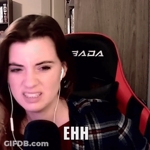 A Woman Wearing Headphones Is Sitting In A Red And Black Gaming Chair With The Word Ehhh Written On It GIF