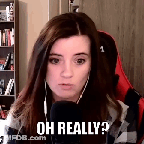 A Woman Wearing Headphones Is Sitting In Front Of A Microphone And Says Oh Really . GIF