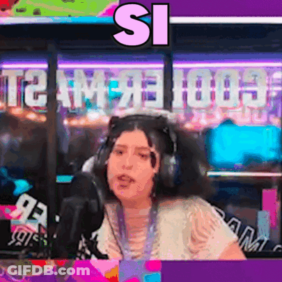 A Woman Wearing Headphones Is Sitting In Front Of A Microphone And The Word Si Is Above Her GIF
