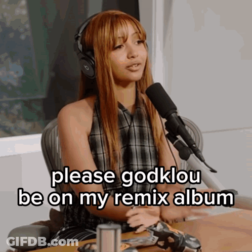 A Woman Wearing Headphones Is Sitting In Front Of A Microphone With The Words Please Godklou Be On My Remix Album Below GIF