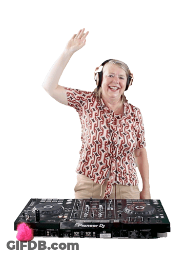 A Woman Wearing Headphones Is Standing In Front Of A Pioneer Dj Mixer GIF