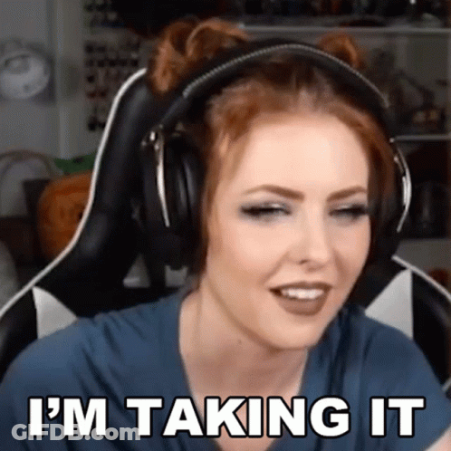 A Woman Wearing Headphones Says " I 'M Taking It " GIF