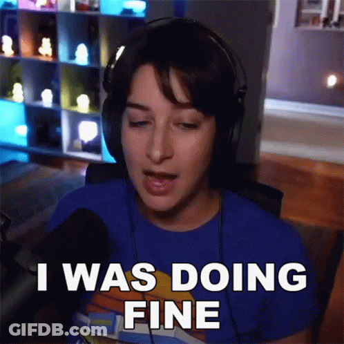 A Woman Wearing Headphones Says " I Was Doing Fine " In Front Of A Microphone GIF