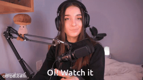 A Woman Wearing Headphones Says " Oil Watch It " GIF