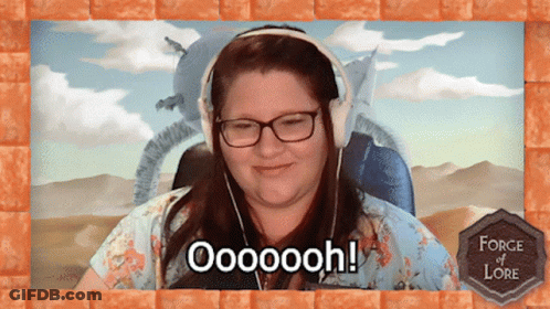 A Woman Wearing Headphones Says Oooooooh In Front Of A Desert Background GIF