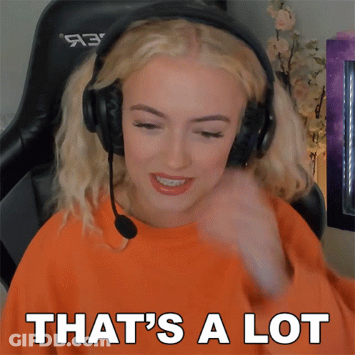 A Woman Wearing Headphones Says " That 'S A Lot " While Sitting In A Chair GIF