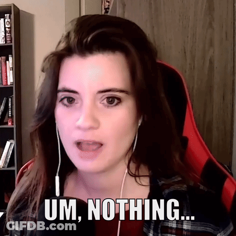 A Woman Wearing Headphones Says Um Nothing In Front Of A Bookshelf GIF