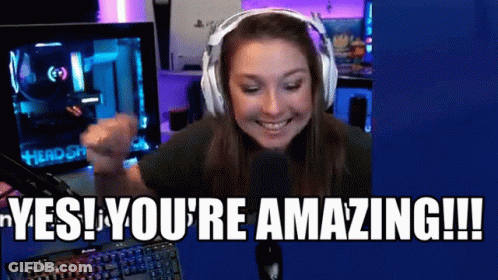 A Woman Wearing Headphones Says " Yes You 'Re Amazing !!! " GIF