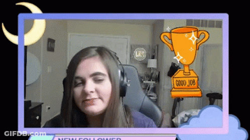 A Woman Wearing Headphones With A Trophy That Says Good Job On It GIF