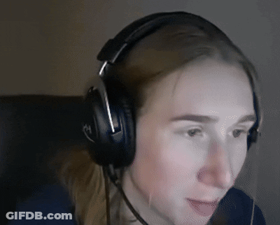 A Woman Wearing Headphones With The Letter H On The Side GIF