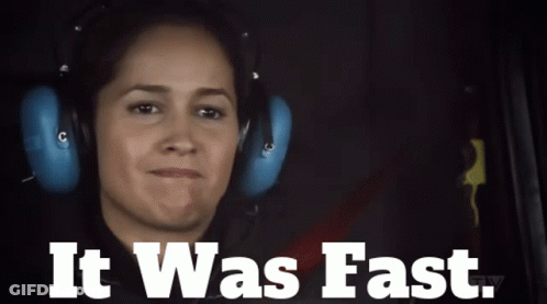 A Woman Wearing Headphones With The Words " It Was Fast " Below Her GIF