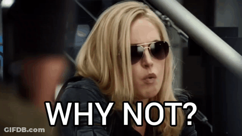 A Woman Wearing Sunglasses And A Black Jacket Is Asking Why Not ? GIF