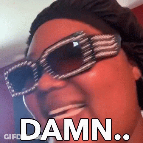 Woman With Sunglasses And Hat Says Damn GIF