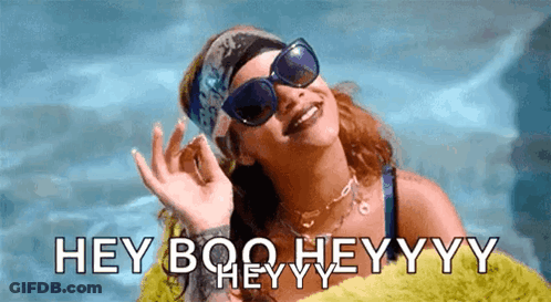 A Woman Wearing Sunglasses And A Headband Says " Hey Boo Heyyyy " GIF